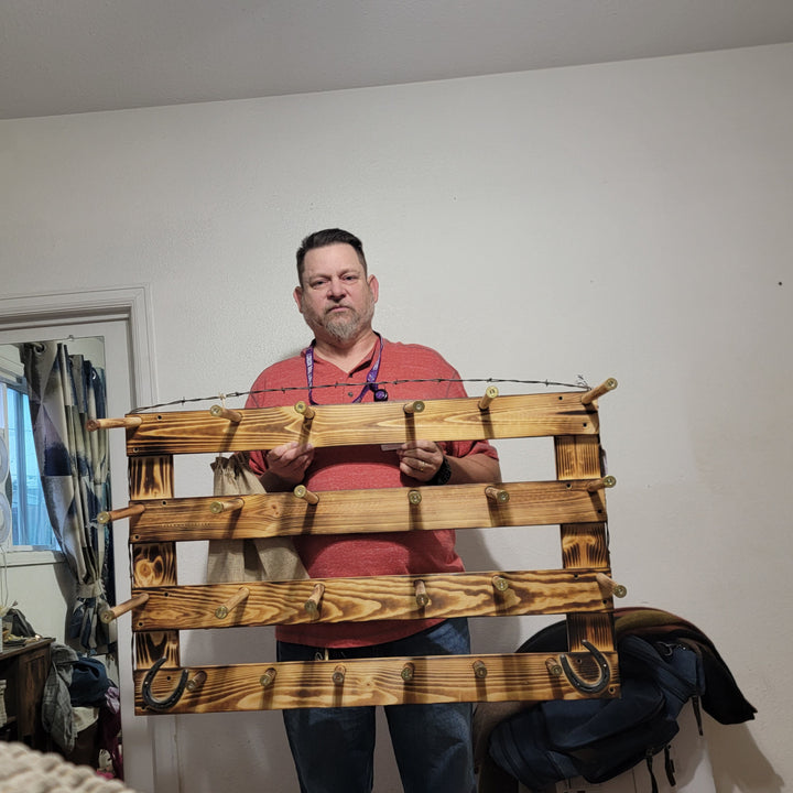 Wall-hanging hat organizer displayed with wooden frame and multiple hat rows