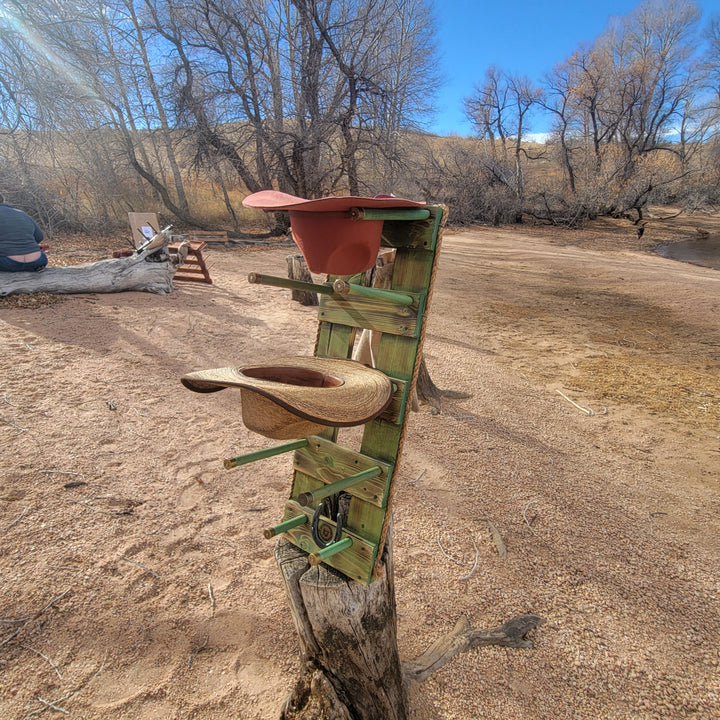 Vertical wooden western organizer with hat holders and small hanging compartments