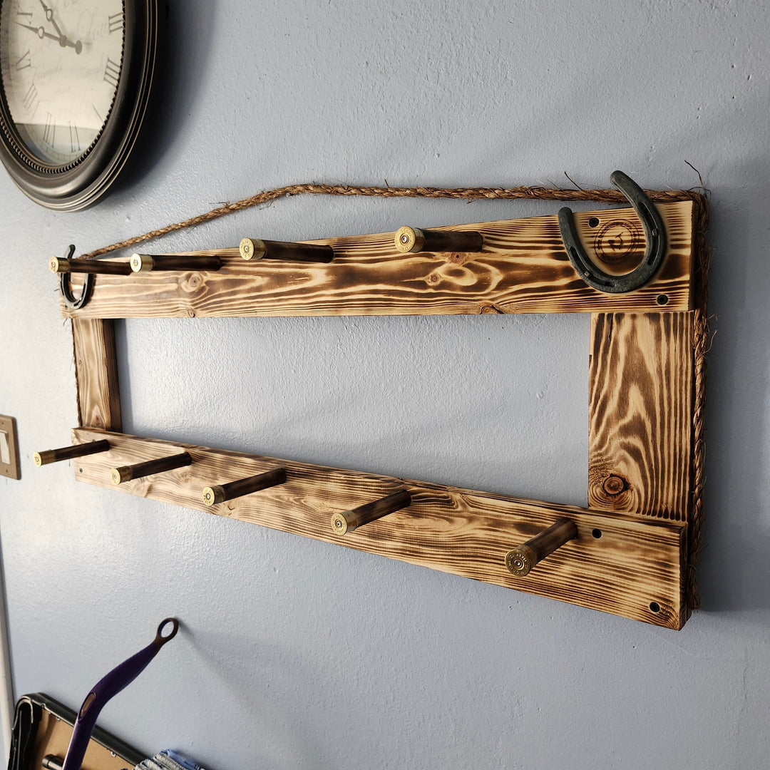 Wall-mounted heritage coat rack with two rows of hooks on a wooden frame