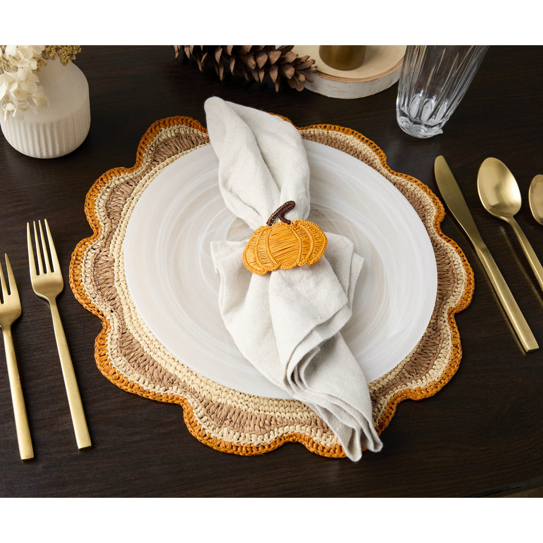 A handwoven Raffia Placemat in Tan, Orange & Brown