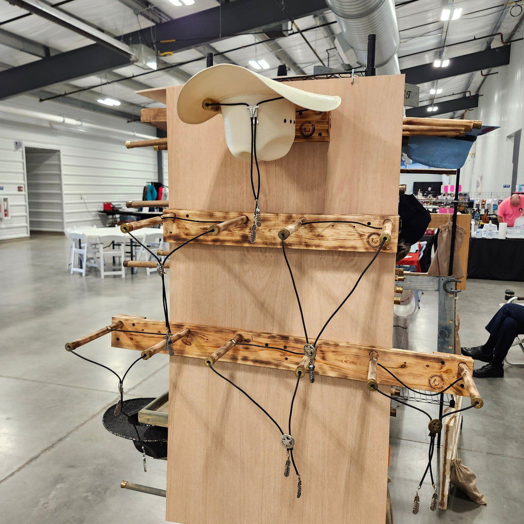Wooden 3-hat trailer rack with curved supports and hanging cords