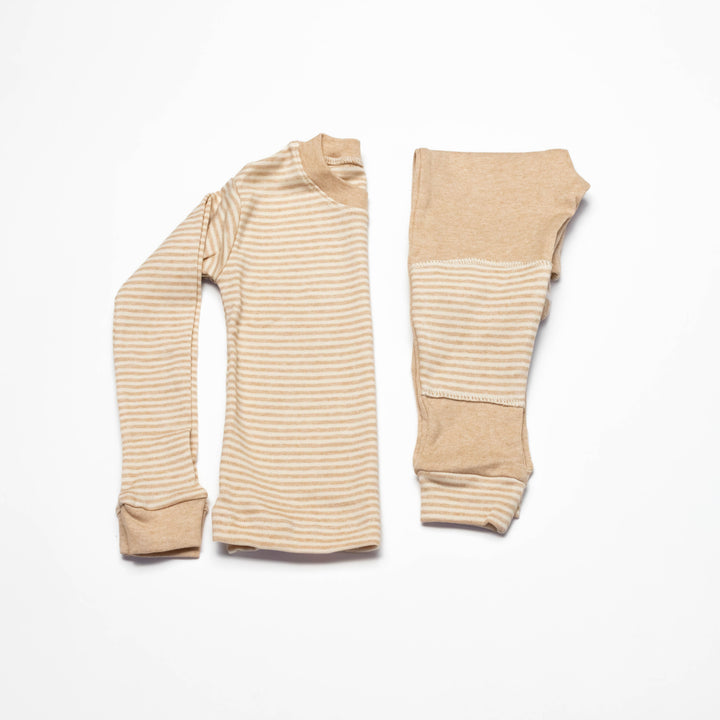 Baby pajama set: long-sleeve striped top and matching solid beige pants, beige with orange stripes