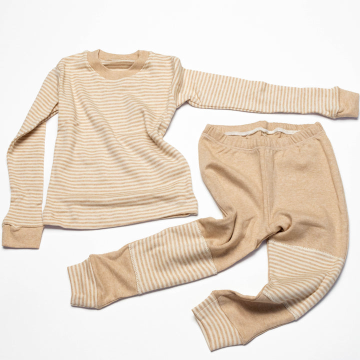 Baby pajama set with long-sleeve striped shirt and jogger pants, beige base with orange stripes