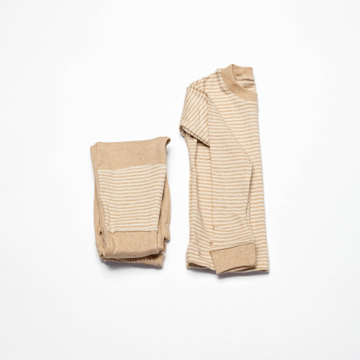Baby pajama set with long-sleeve striped top and matching beige pants, cuffed hems and orange stripes