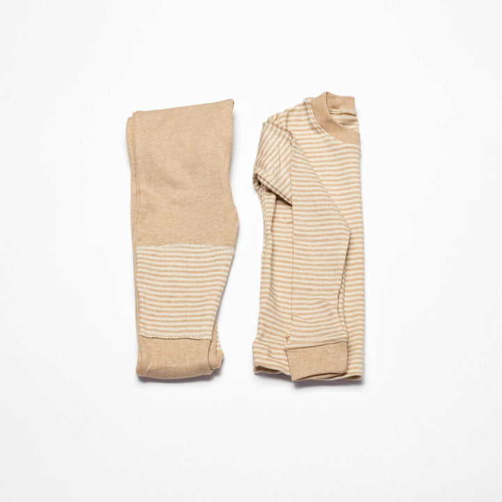 Beige organic baby pajama set with striped crew-neck top and solid cuffed pants