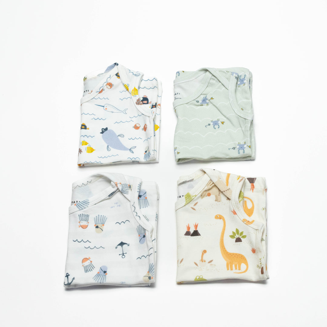 Toddler undershirt tops 4-pack, folded, with sea animal prints in light tones