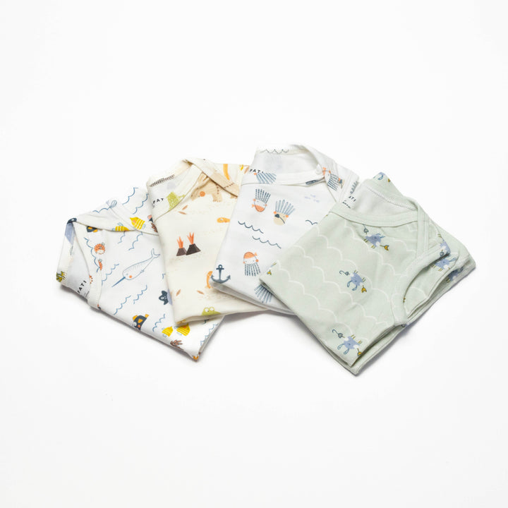 Toddler undershirt tops 4-pack, folded and overlapping, mixed sea animal prints