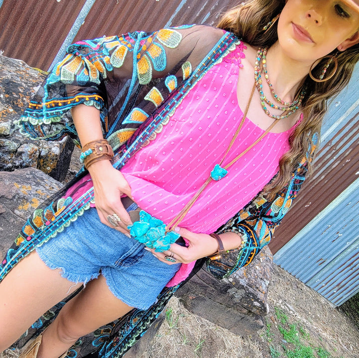 Turquoise Regalite belt buckle with clustered stone slabs and silver metal frame
