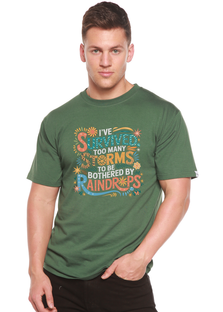 Unisex green graphic t-shirt with colorful “Survived” storm-themed text