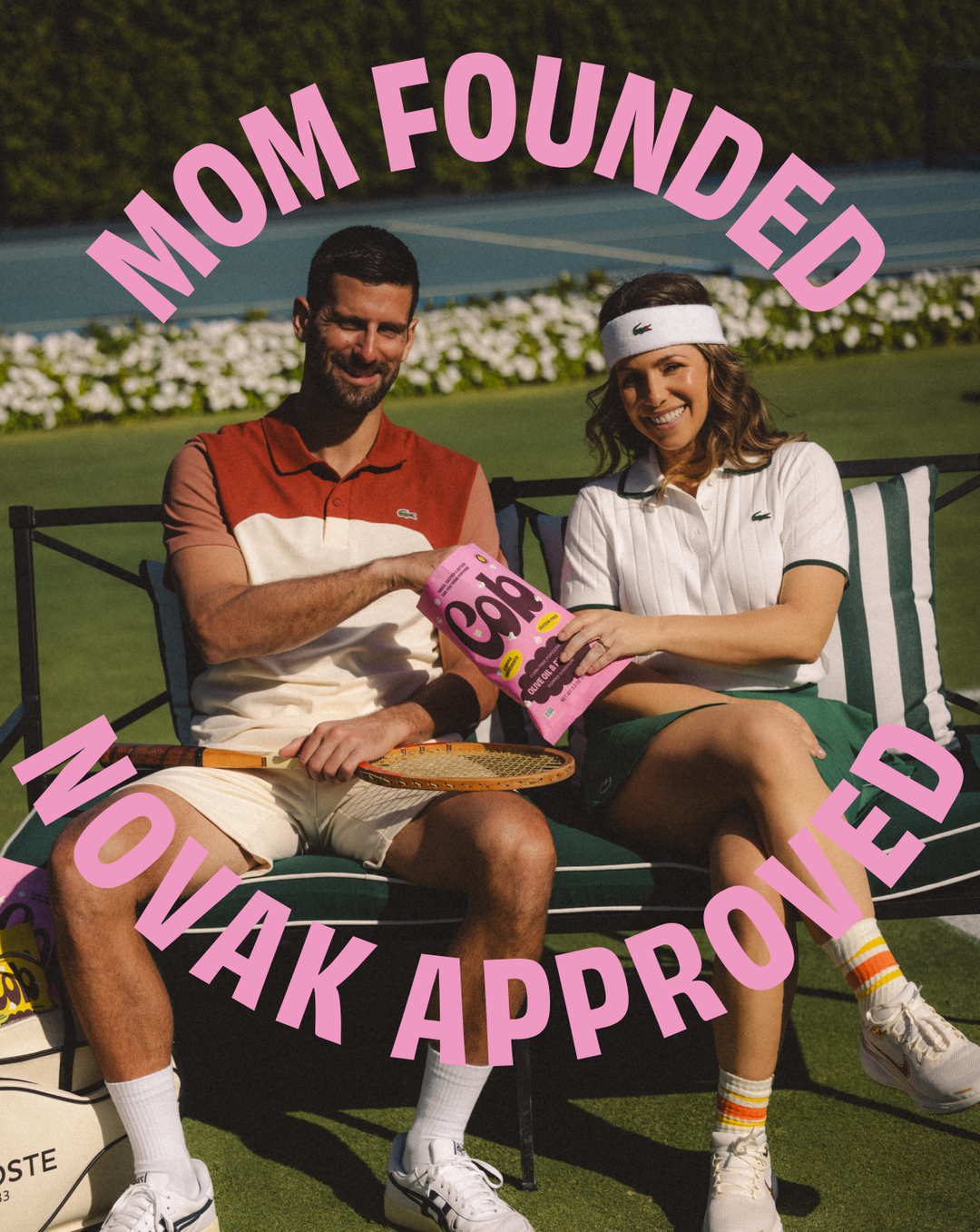 People holding Pop! popcorn bag on a park bench; pink flavor bag shown.