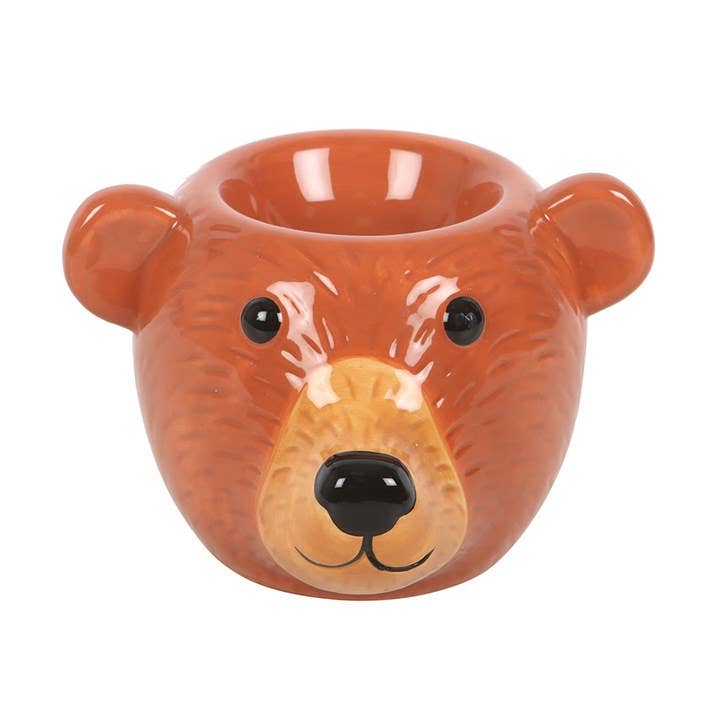 Orange bear oil burner with ears, smiling face, and round open wick bowl at top
