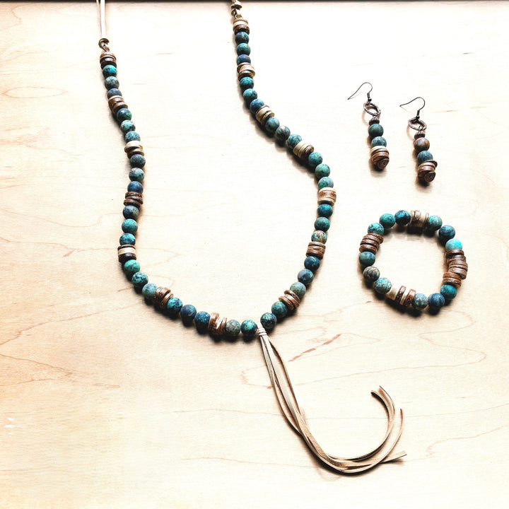 Frosted turquoise and dark blue bead stretch bracelet with wood barrel spacers