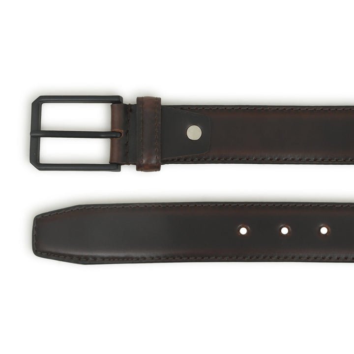 Brown leather belt buckle end and strap with stitched edge and hole row