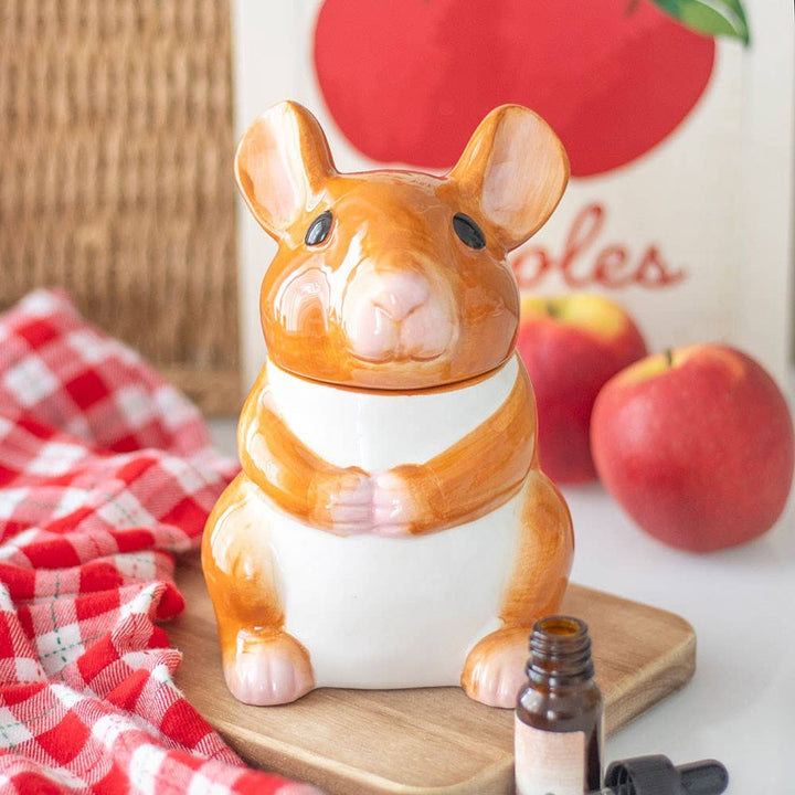 Mouse-shaped ceramic oil burner with white stripe and warming bowl on base