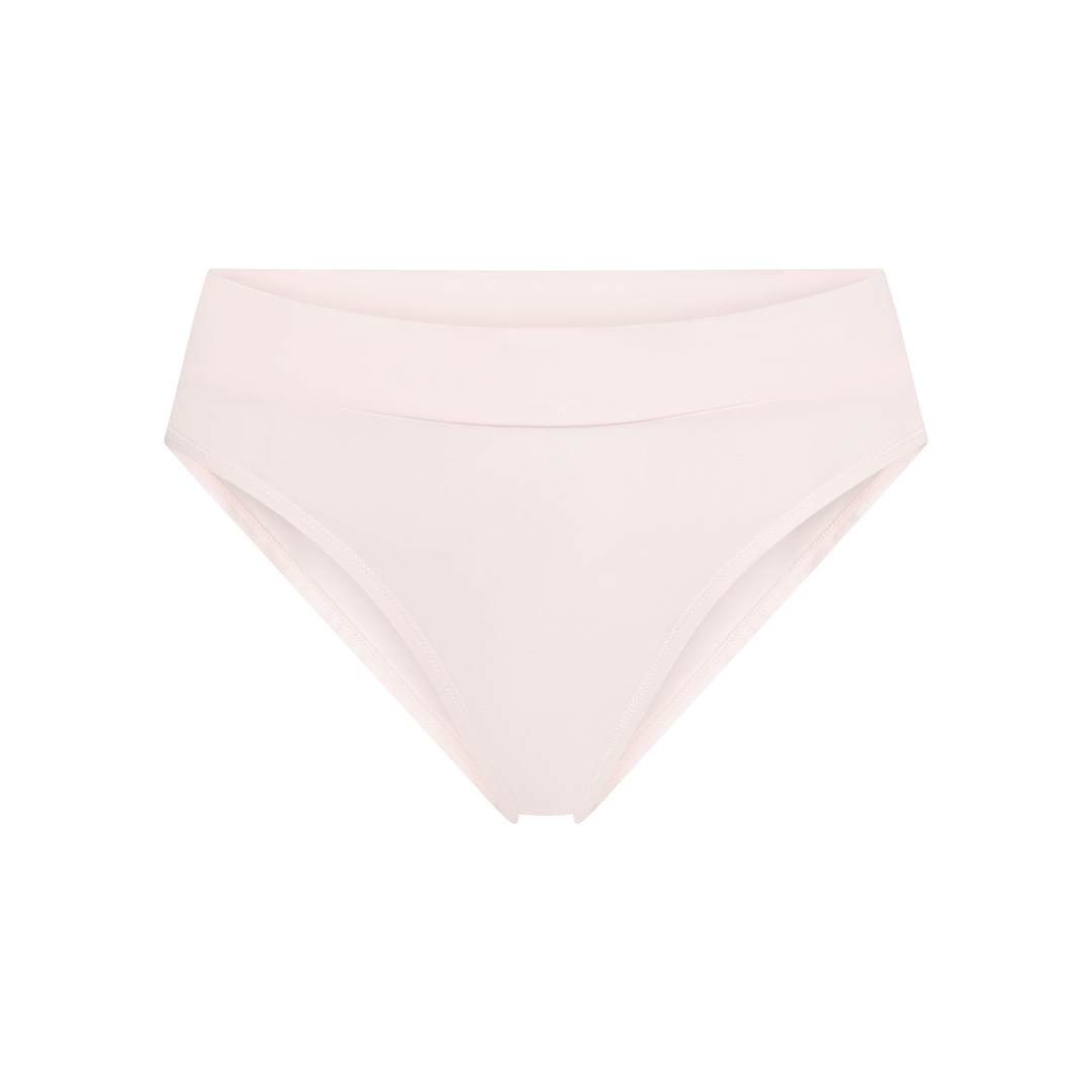 Light pink cheeky tanga briefs, low-rise with smooth fabric and minimal coverage.