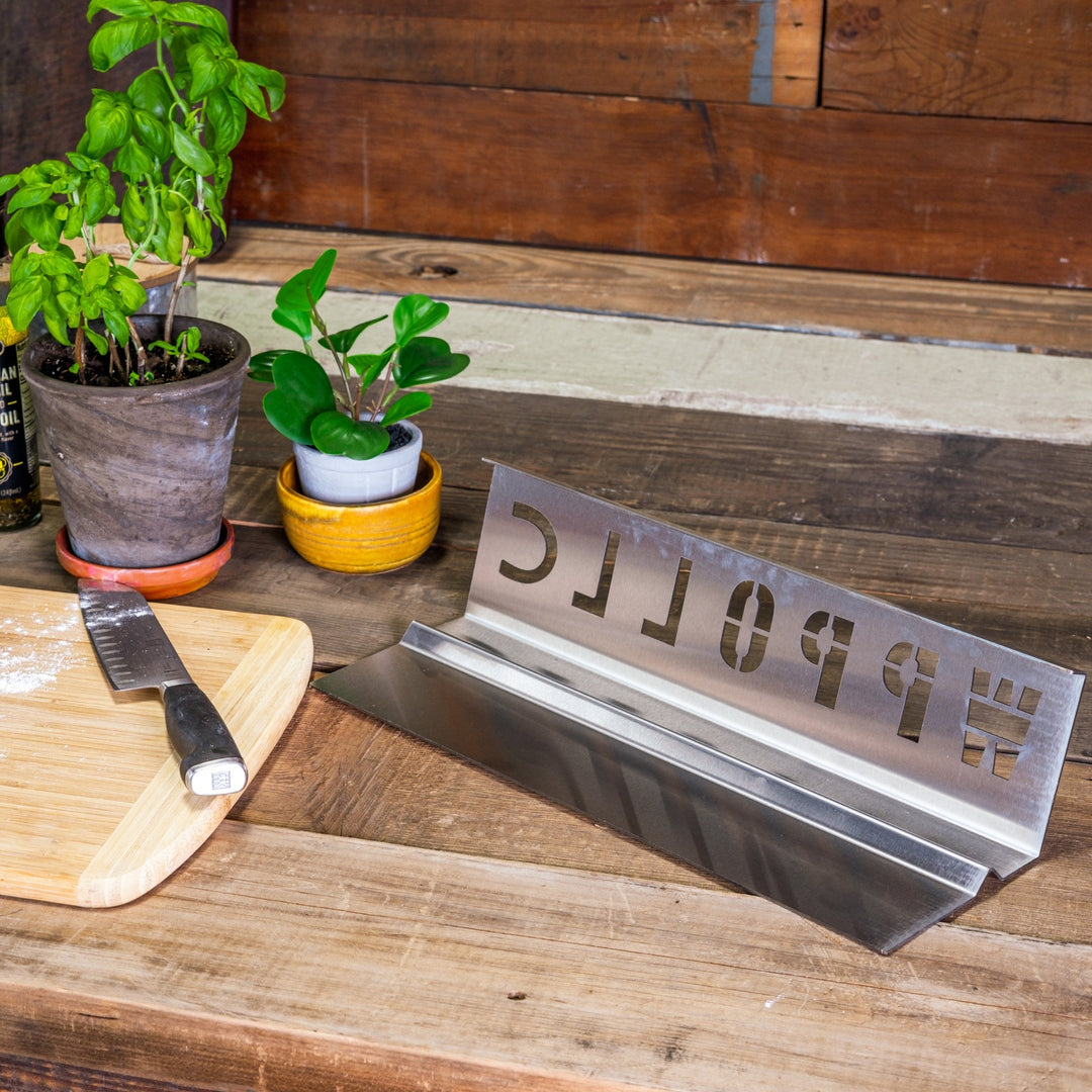 Stainless steel heat deflector with engraved lettering, flat angled design
