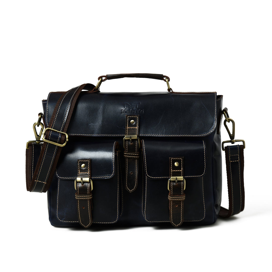 Dark blue laptop messenger bag front with flap, buckles, and dual front pocket straps