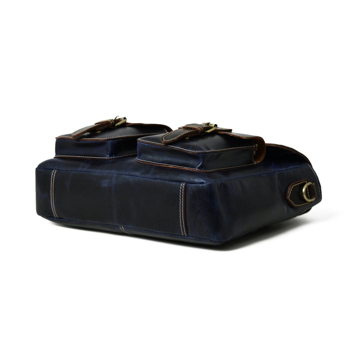 Dark blue laptop messenger bag bottom view with protective feet and stitched seams