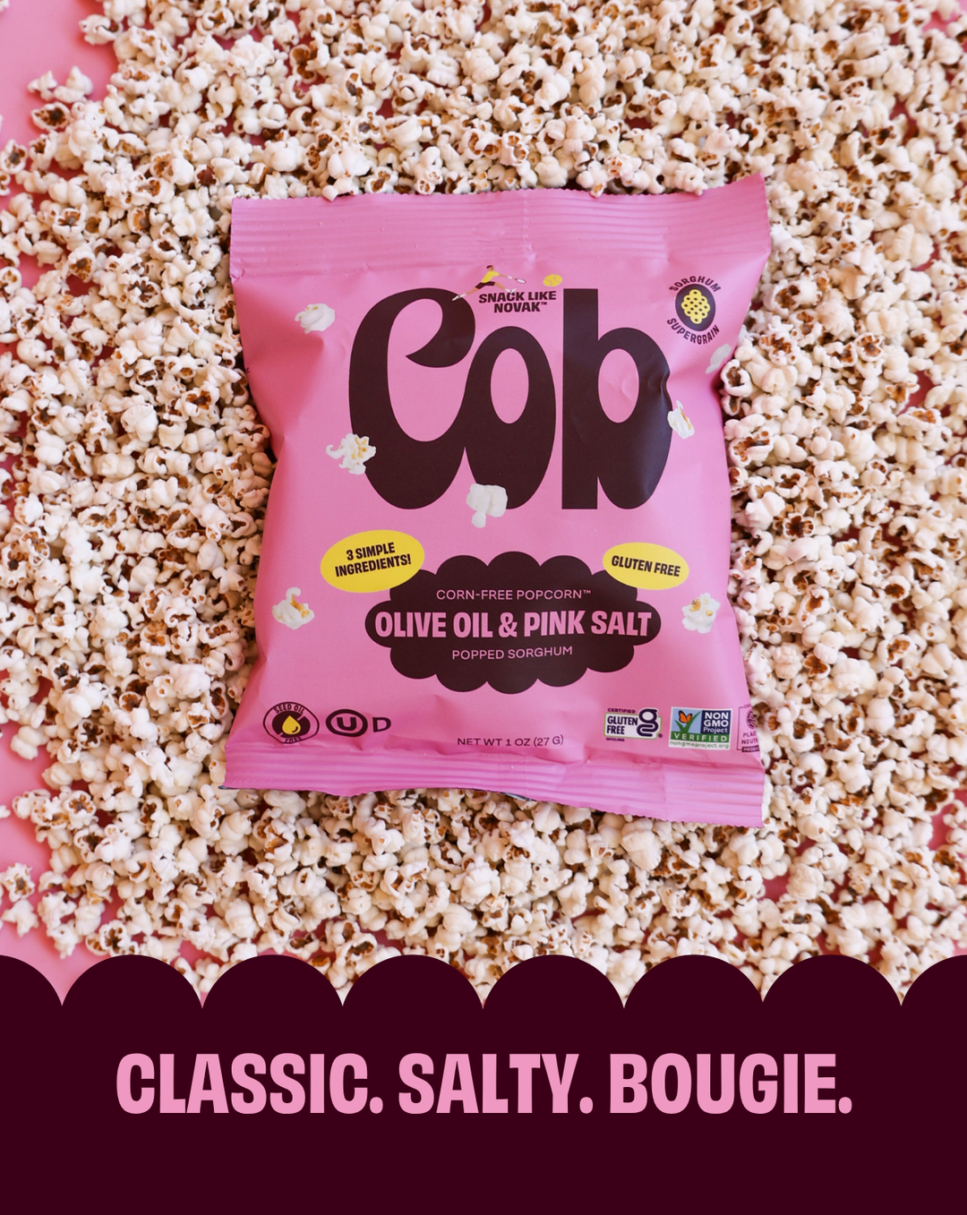 Pink Pop! popcorn snack bag labeled Olive Oil &amp; Pink Salt.