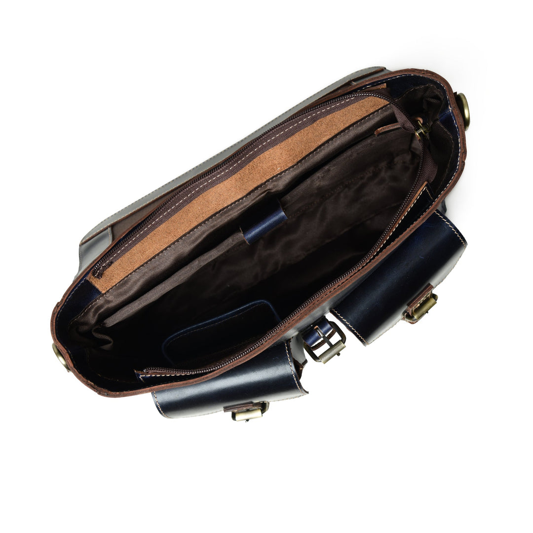 Dark blue laptop messenger bag interior view with zip closure and leather trim