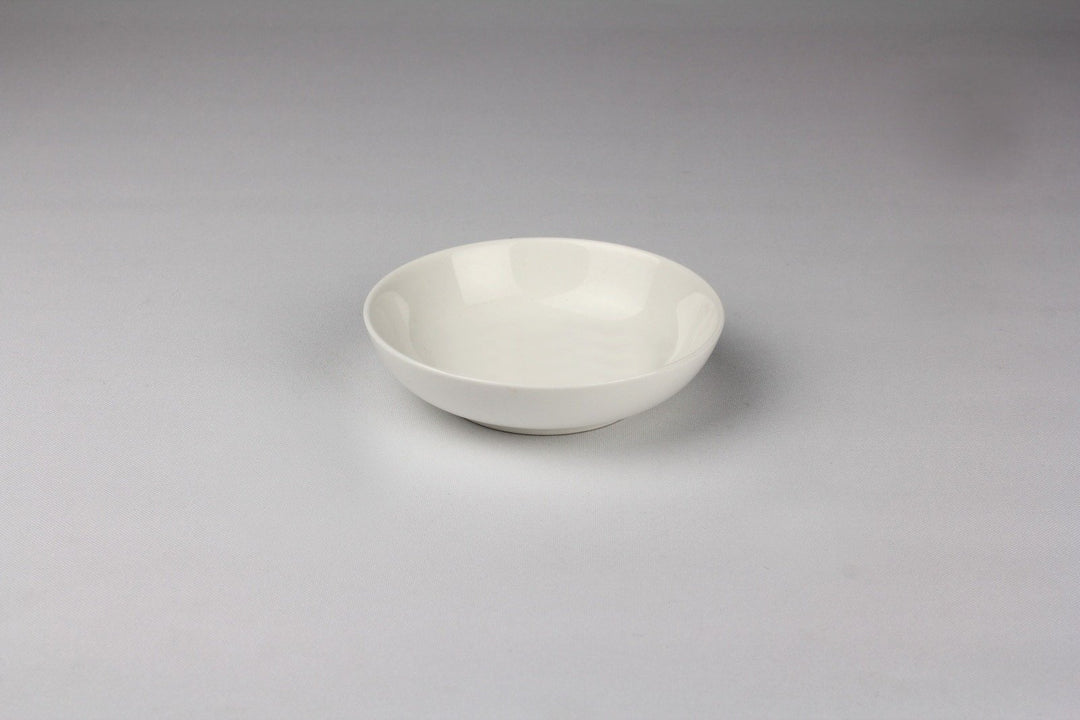 White round porcelain soy dish with wide rim, shallow bowl