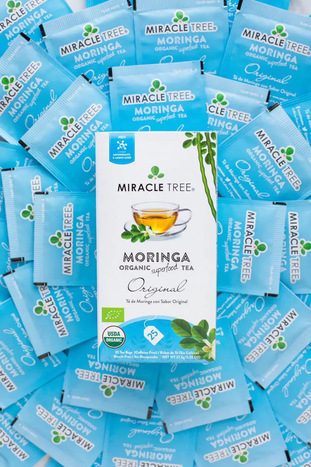 Assorted Miracle Tree Moringa Original tea bags in blue wrappers
