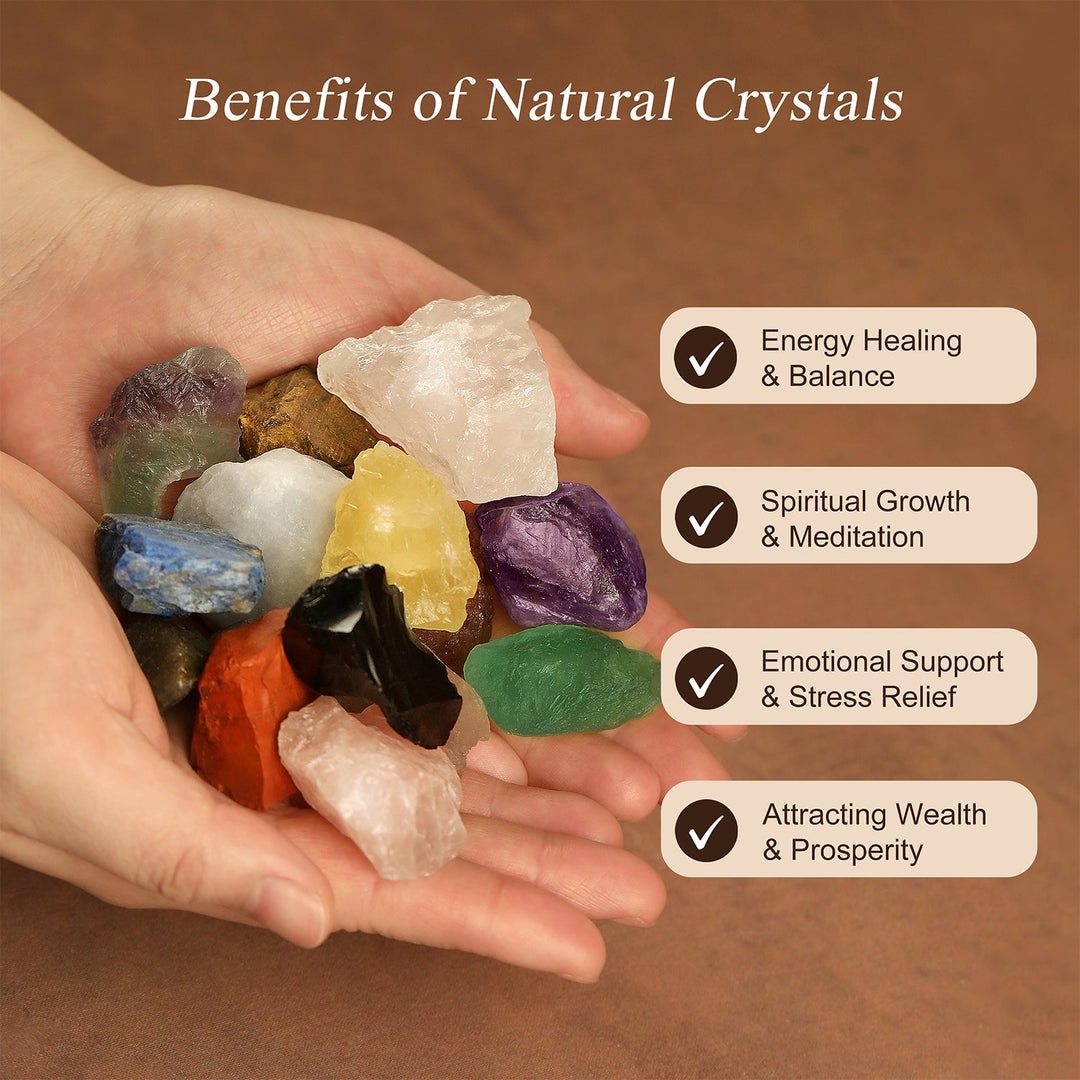 Assorted natural crystal stones held in hands