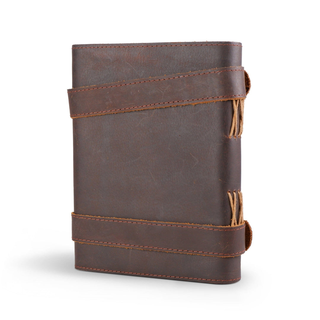 Dark brown leather journal back with stitched bands and pull-string tassels
