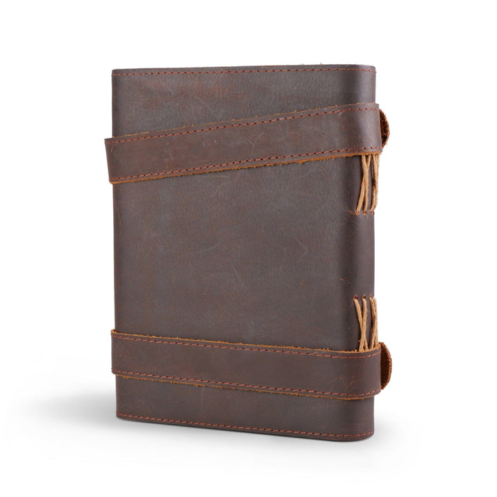 Dark brown leather journal back with stitched bands and pull-string tassels