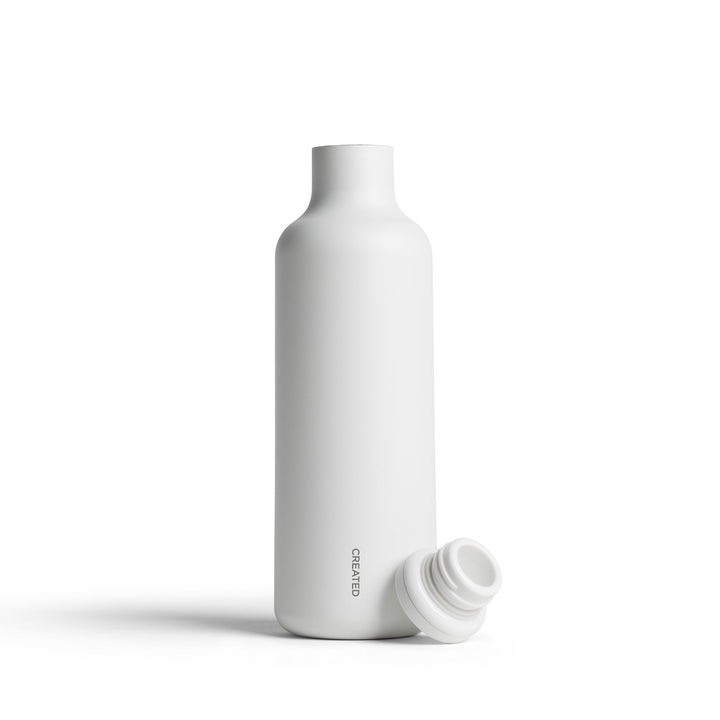 White wine carafe with stopper removed, rounded pour opening
