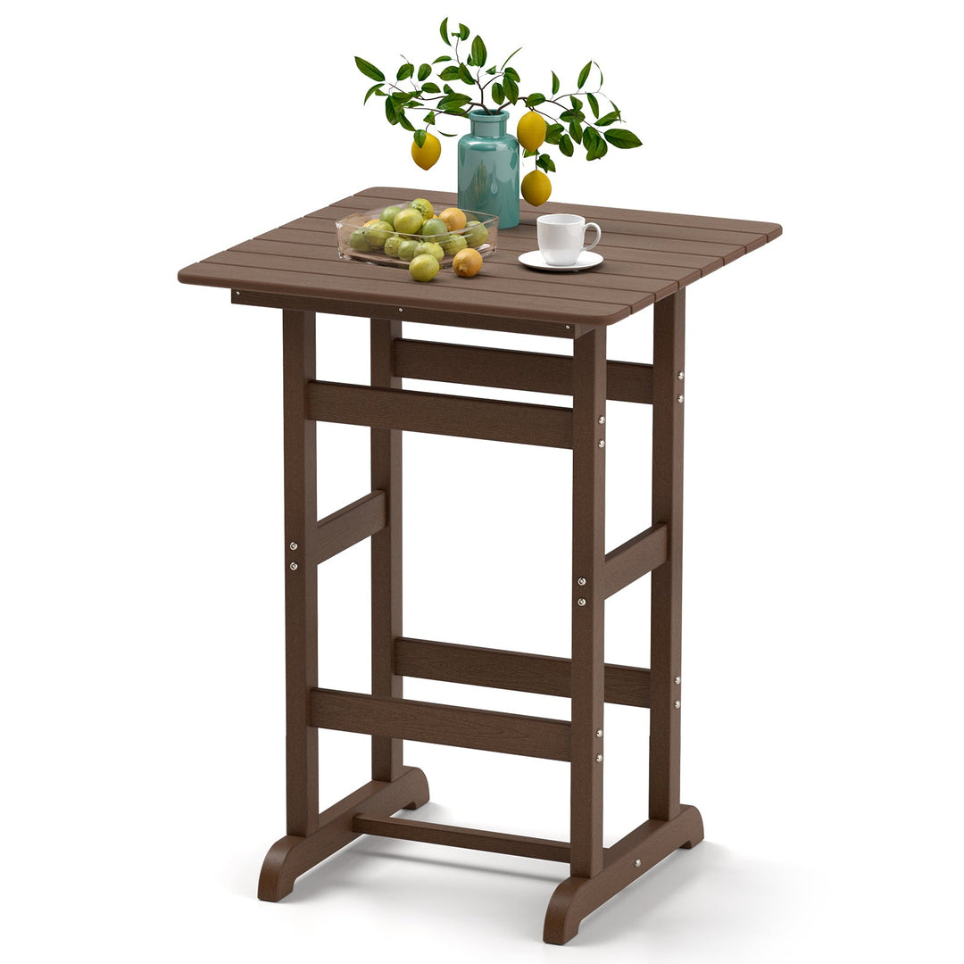Brown square bar table with slatted top and decorative items on surface