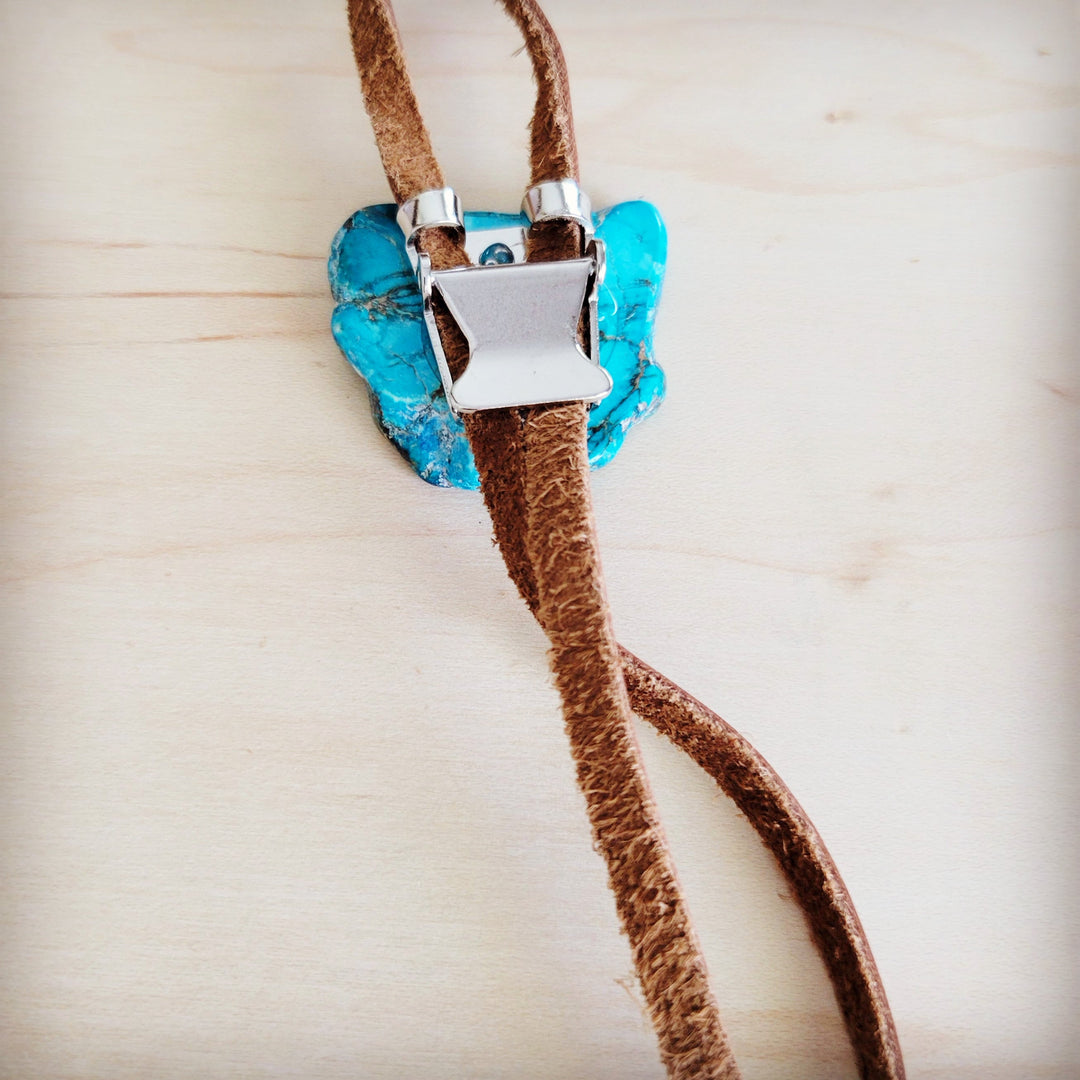 Blue stone slab pendant with silver square clasp on brown leather lariat cords