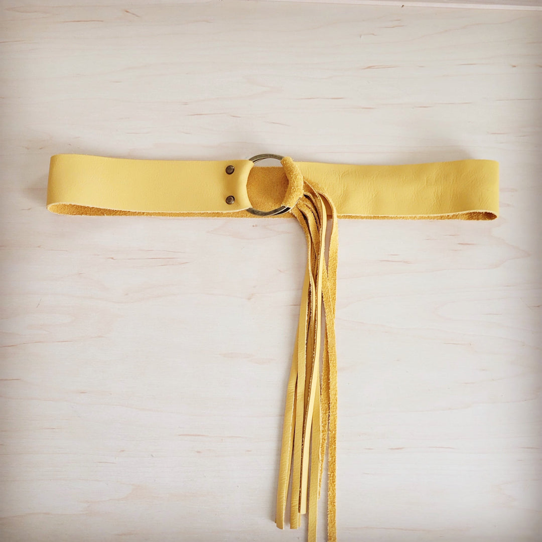 Mustard leather belt with fringe tassels and snap-ring closure