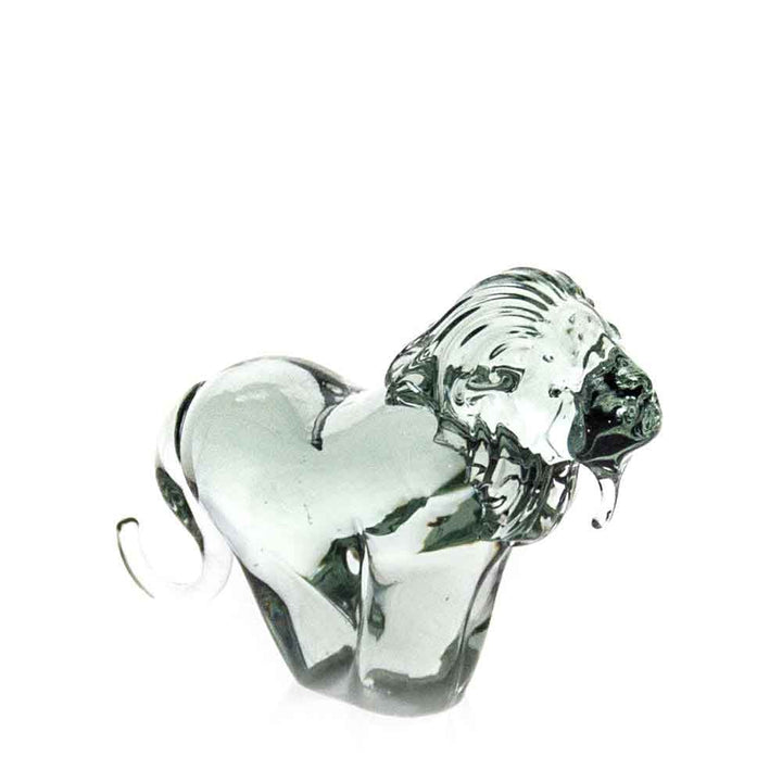 Recycled-glass lion figurine, shiny clear silver, angled view, tail extended.