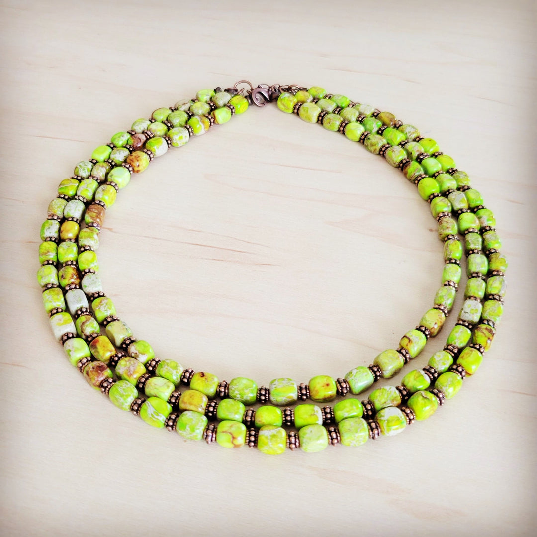 Three-strand beaded necklace with lime green cube beads and dark brown spacers