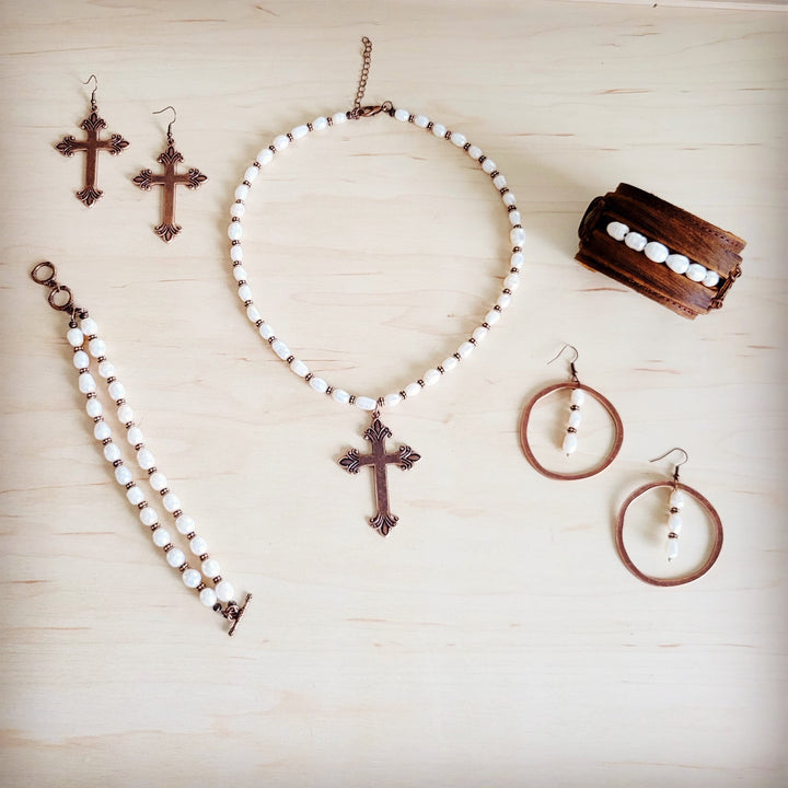 Freshwater pearl beaded bracelet with copper cross charm, white beads and clasp loop