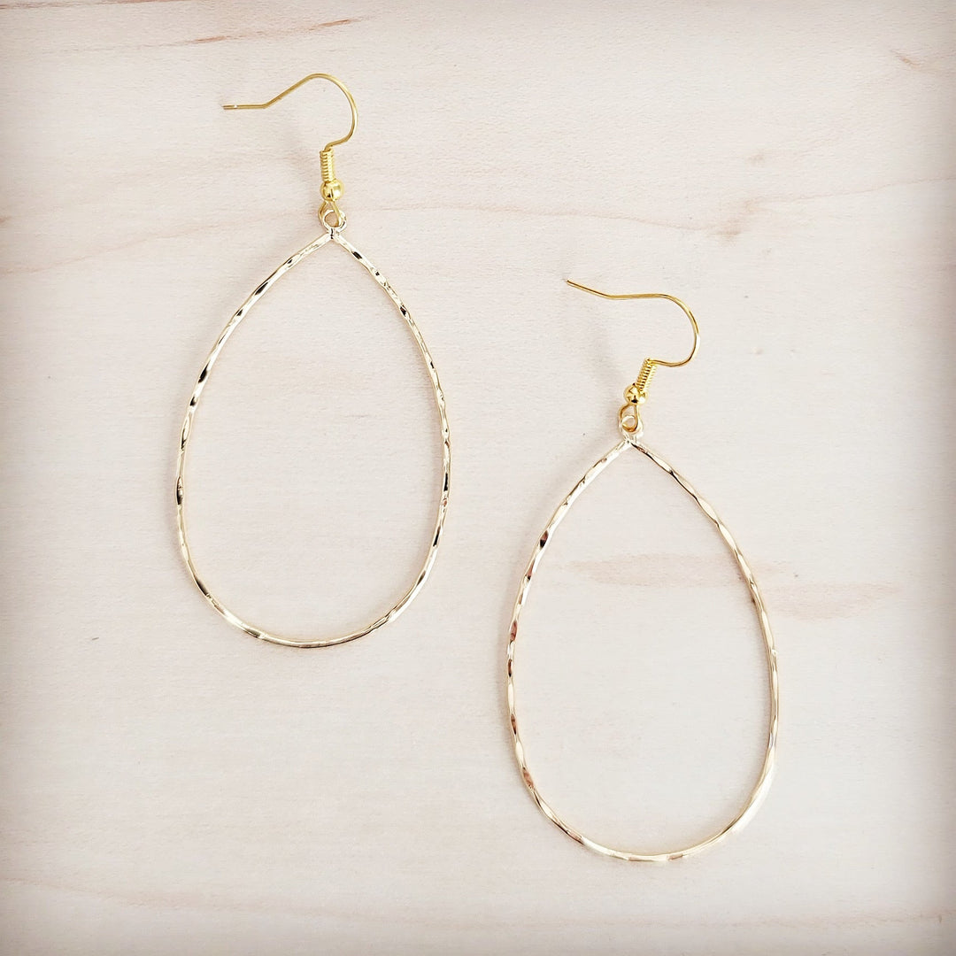 Gold hammered teardrop hoop earrings with small round top detail and fishhook backs