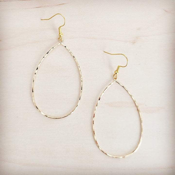 Gold hammered teardrop hoop earrings with small round top detail and fishhook backs