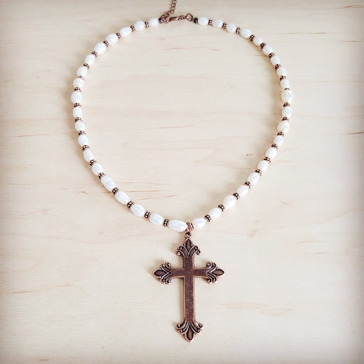 Freshwater pearl collar necklace with bronze cross pendant on bead strand