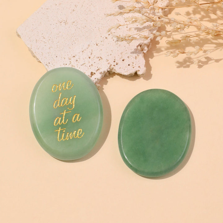 Pocket crystal stone pair in green with gold "one day at a time" text