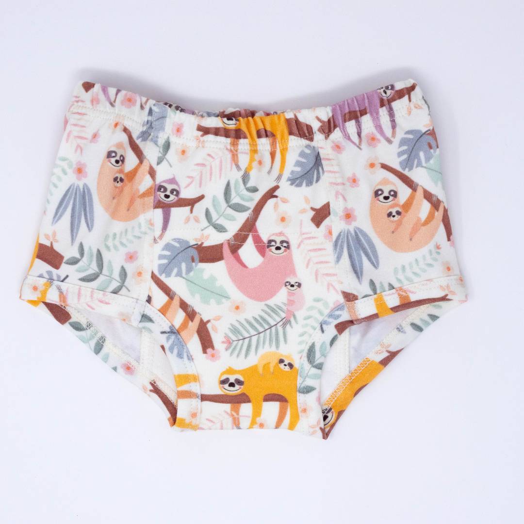 Kids training underpants in cream with colorful sloth and jungle animal pattern, elastic waist