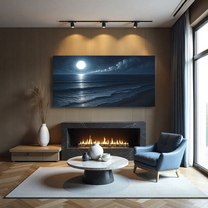 Moonlit ocean landscape canvas above a fireplace, in dark blue tones