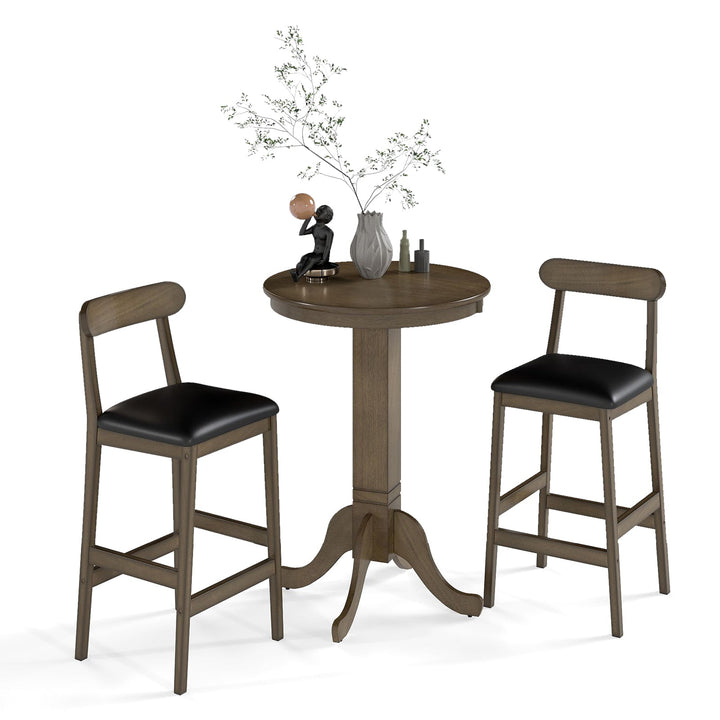 Pedestal round pub table with two armless stools; dark wood finish and black seat pads