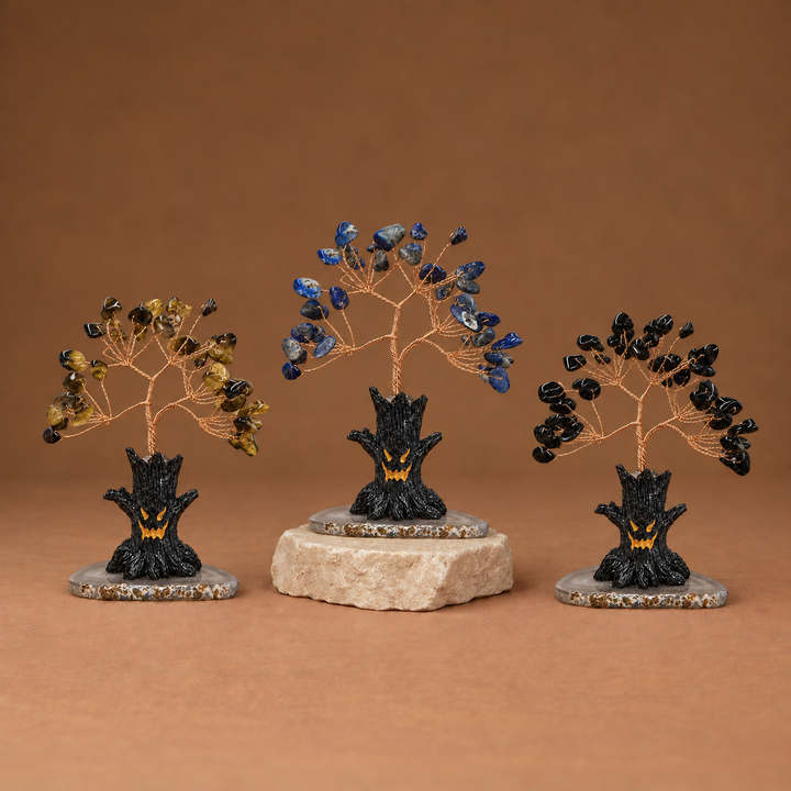 Halloween crystal tree sculpture set with blue and gold gemstone branches on black bases
