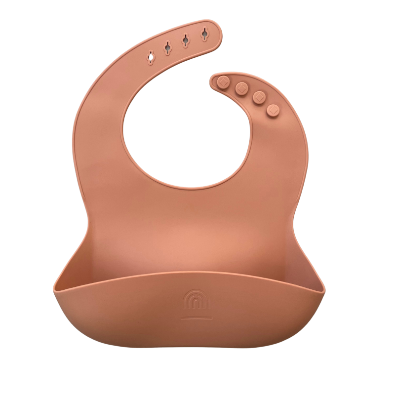 Orange silicone bucket bib with snap buttons and front crumb catcher pocket