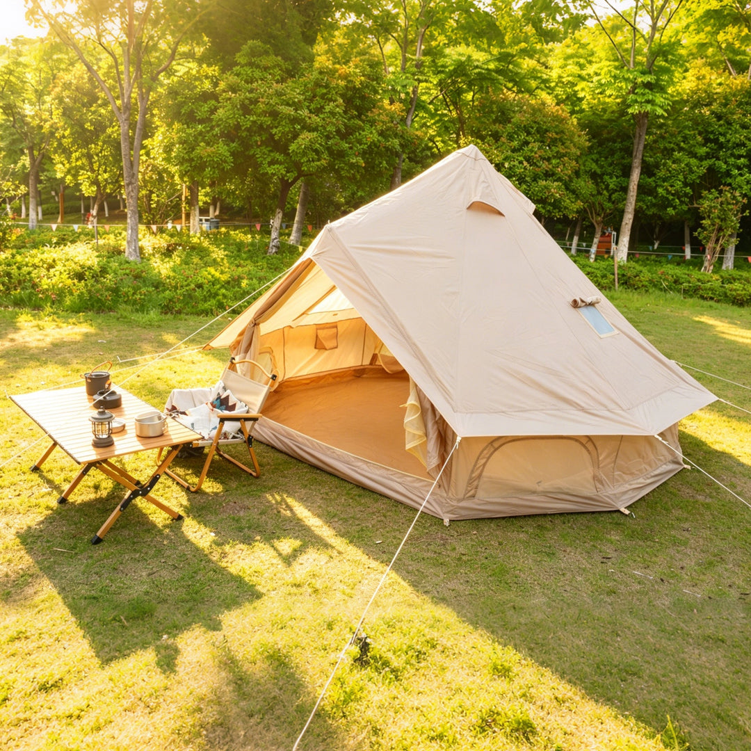 Bell camping tent with side entrance open and beige interior, white outer canvas