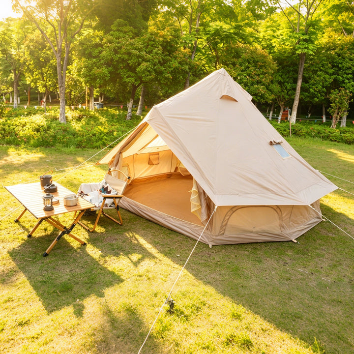 Bell camping tent with side entrance open and beige interior, white outer canvas