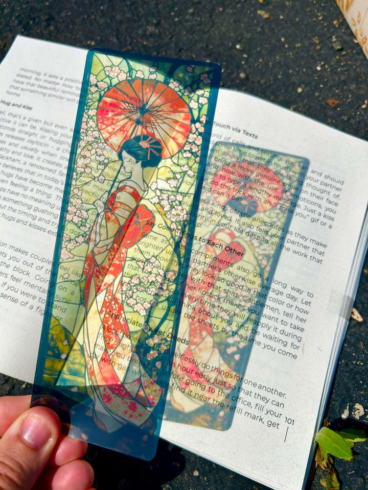Geisha art bookmark with colorful mosaic figure on open book page