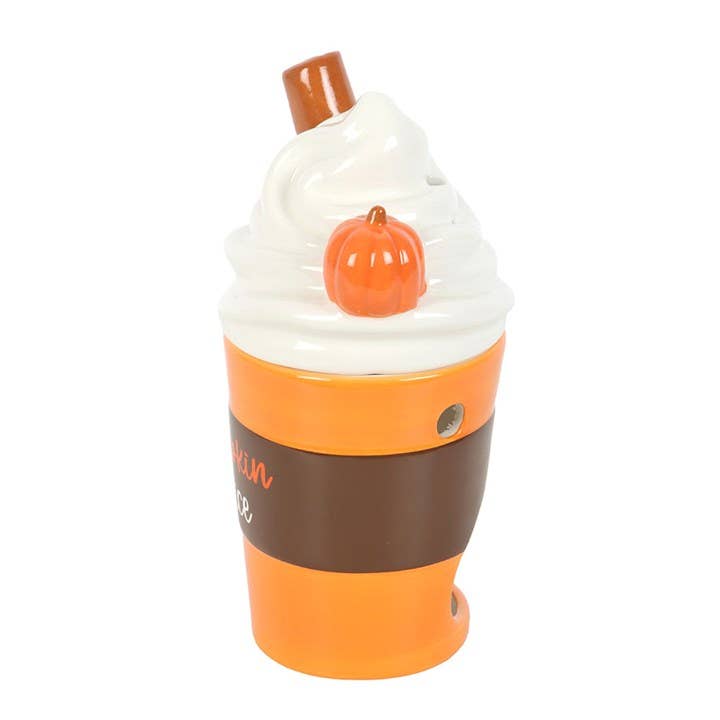 Ceramic pumpkin spice oil burner with orange base, brown band, white lid and pumpkin knob