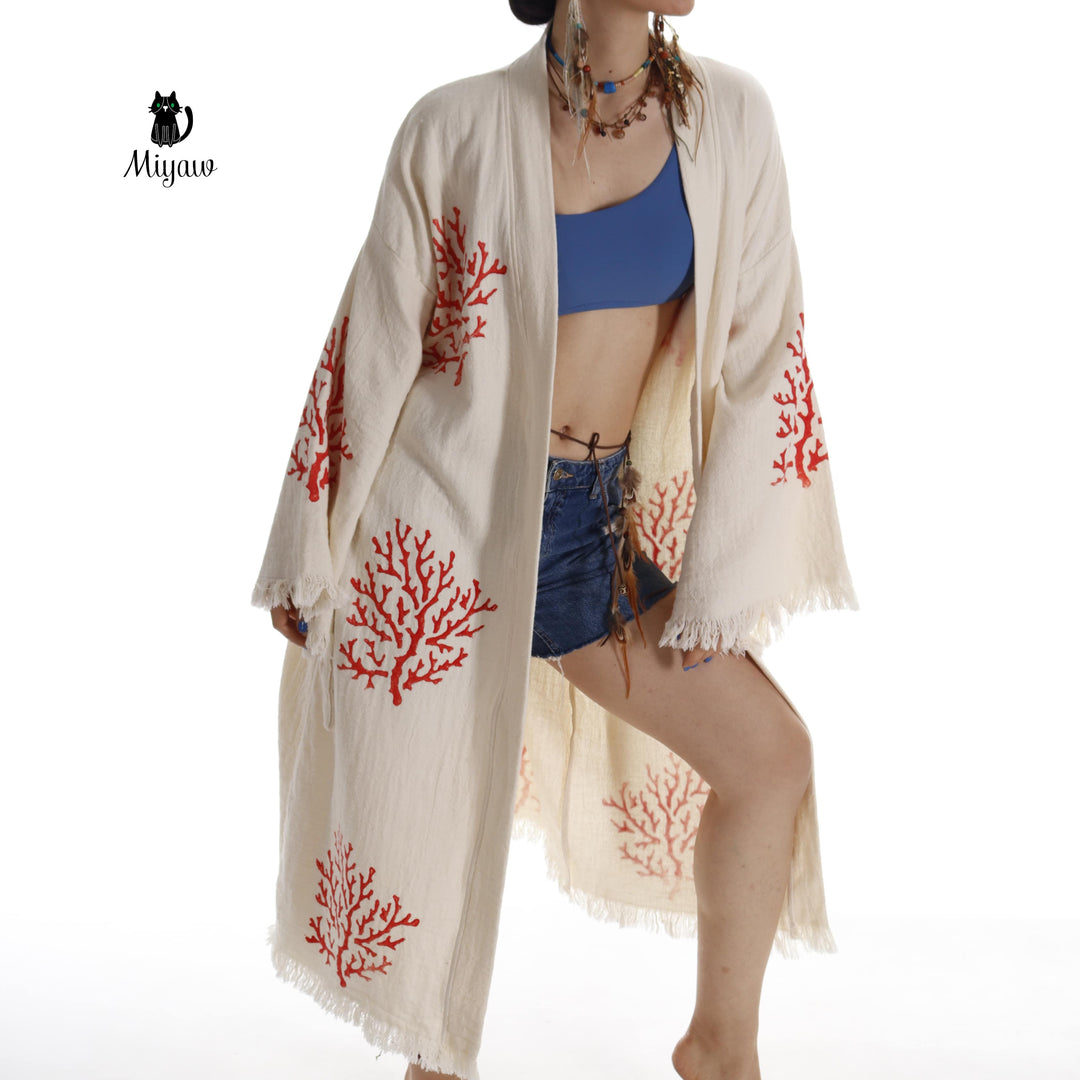 Beige kimono robe with red coral embroidery, wide sleeves, open front and long fringe
